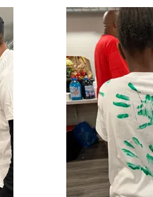 Child wearing a handprint art shirt